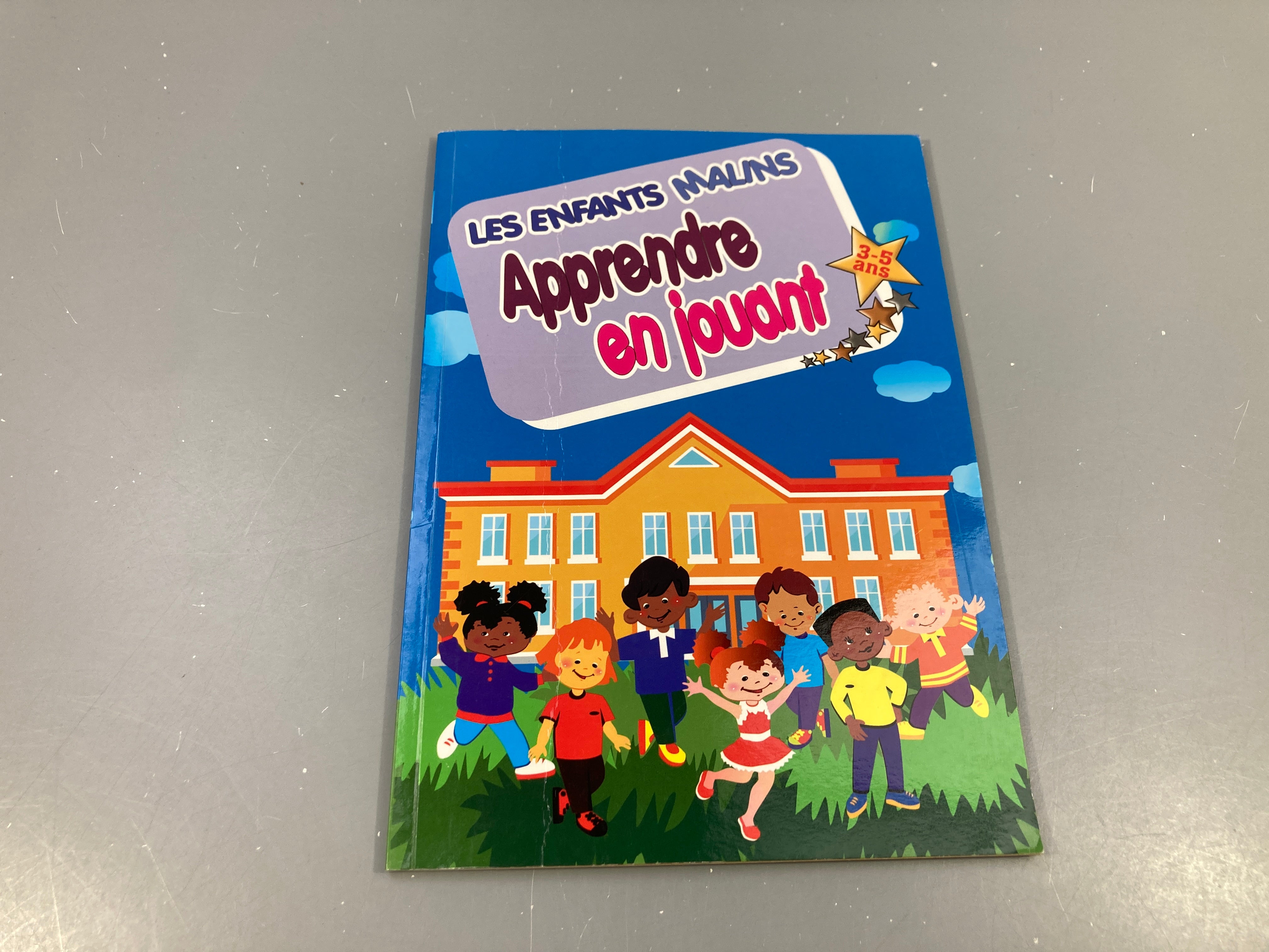 Les enfants malins-Apprendre en jouant 3-5a (Couverture pliée au milieu)