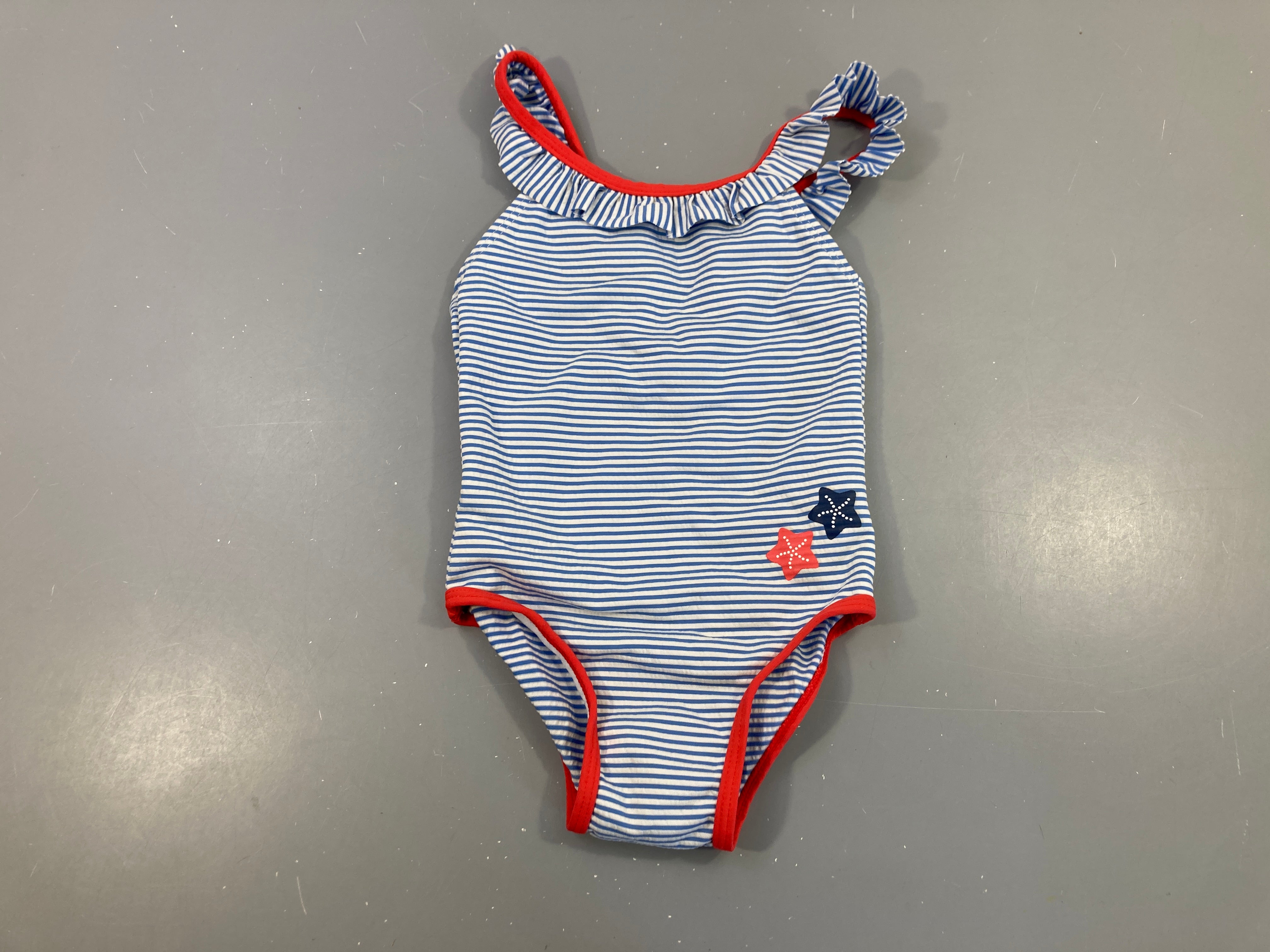 Maillot blanc rayé bleu texturé bord rouge