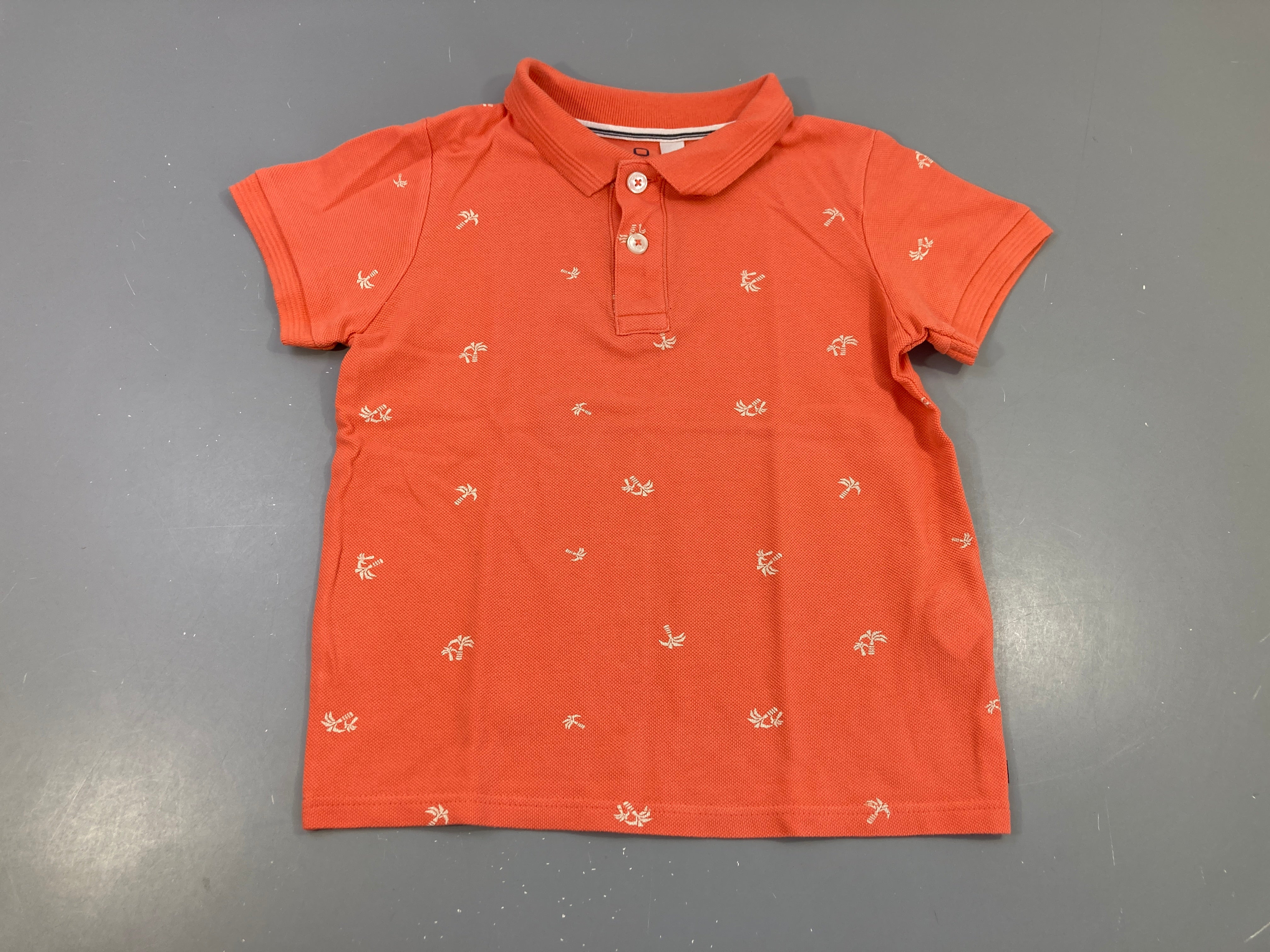 Polo m.c orangé Palmiers blancs