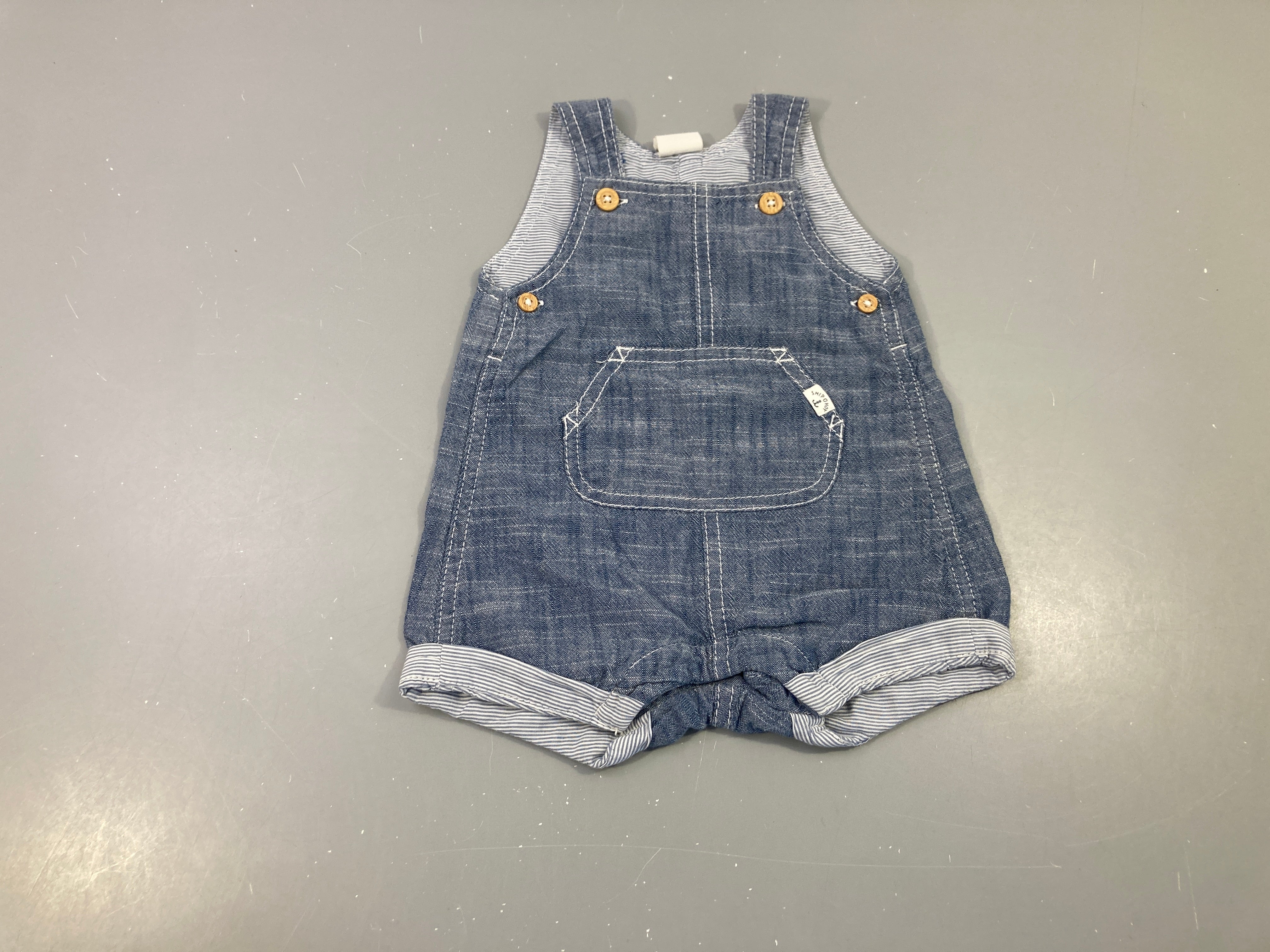 Salopette short denim à revers