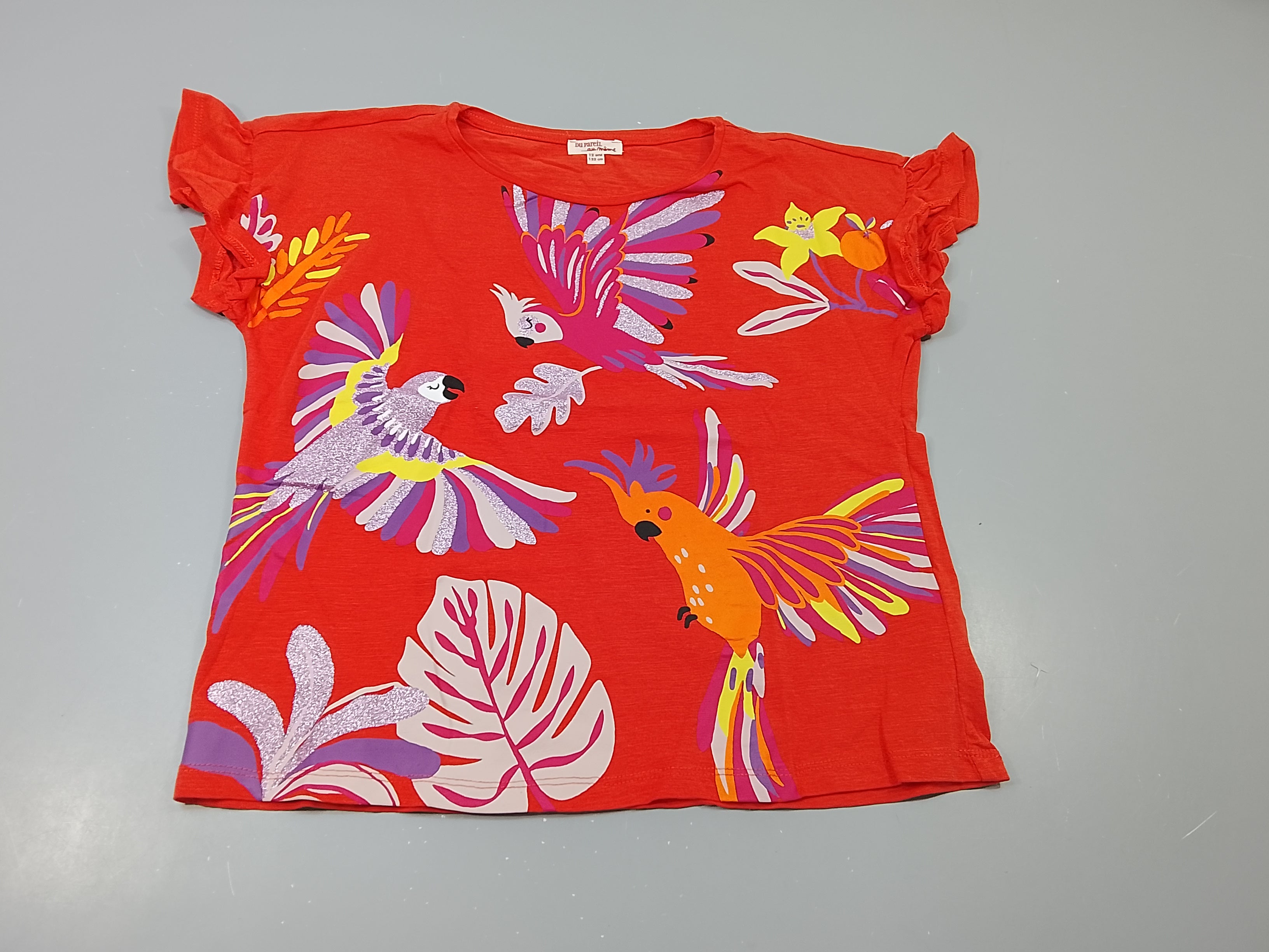 T-shirt m.c rouge orangé , oiseaux colorés, pailletés