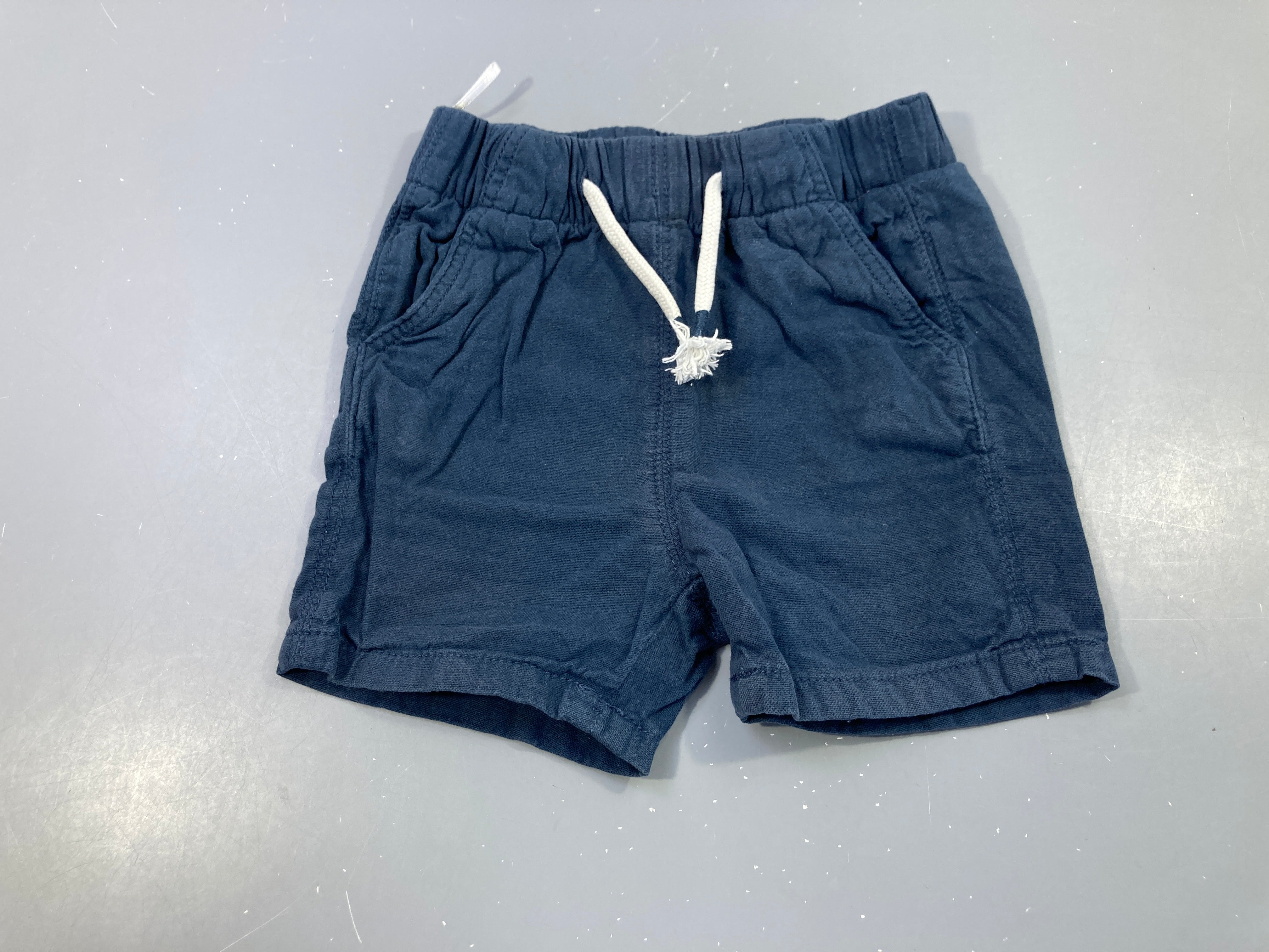 Short bleu foncé coton taille élastique légèrement délavé